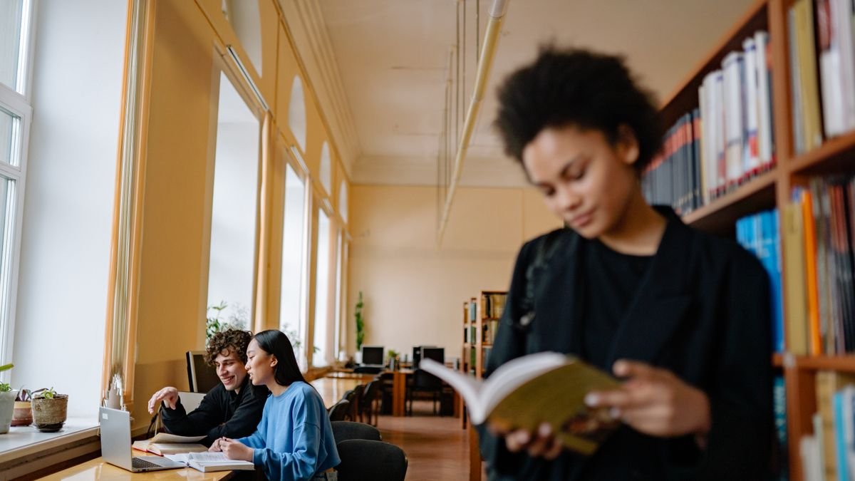Students studying together in a university library
